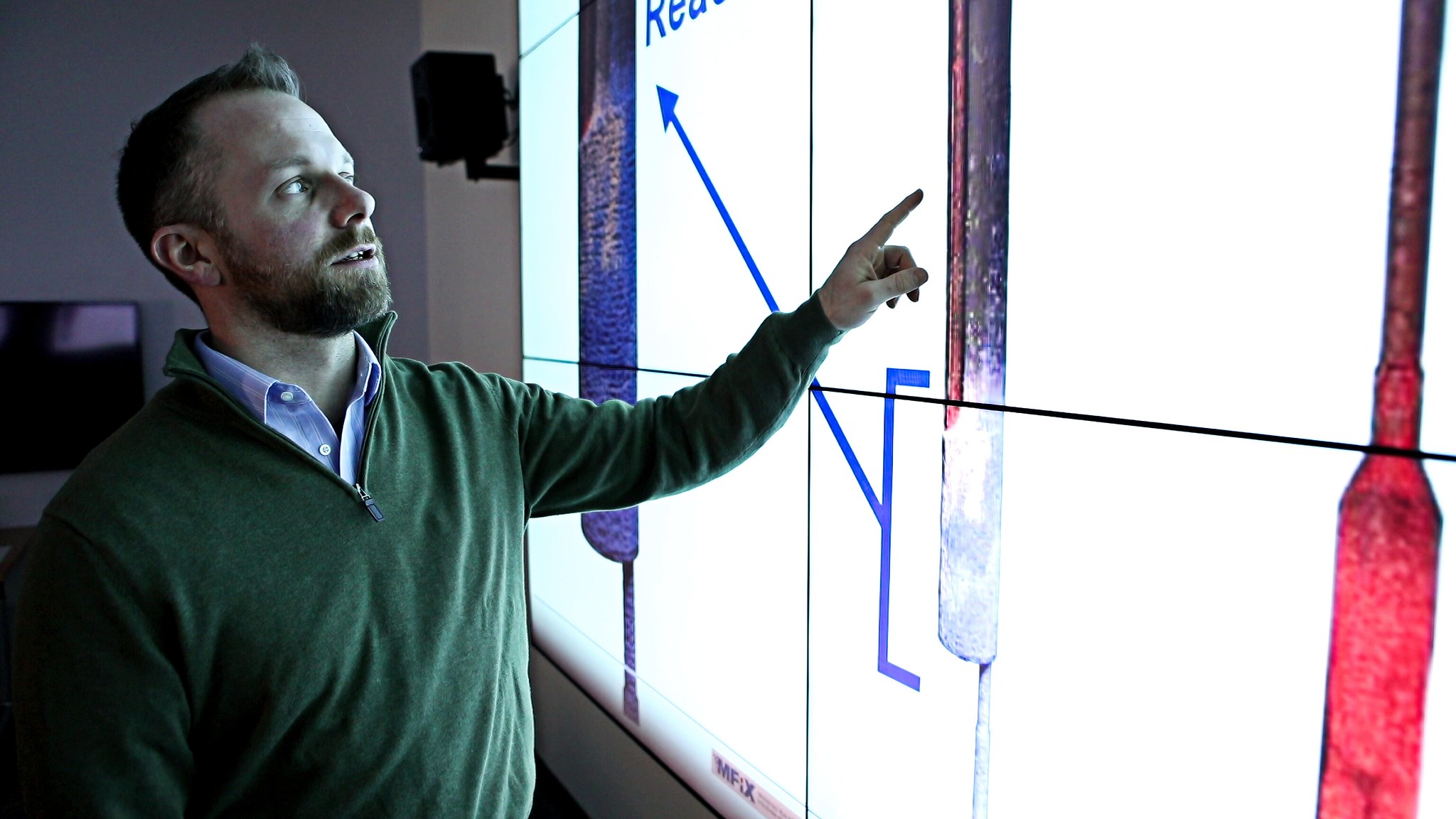 NETL’s Jordan Musser examines multiphase flow within a reactor using the Lab’s Multiphase Flow with Interphase eXchanges (MFiX) code.