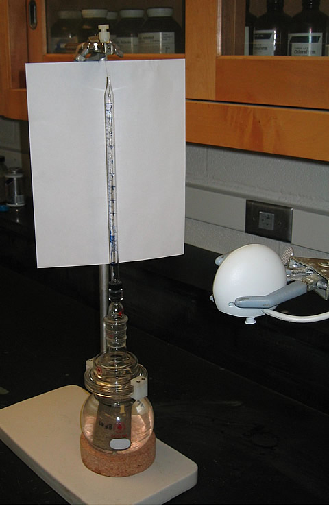 Video logging of spontaneous imbibition. The conventional way of obtaining dynamic spontaneous imbibition data is to suspend the core in an imbibition cell below an electronic balance, and the change in mass is measured with respect to time. However, this is vulnerable to disturbance, with the displaced oil drops sticking to the core surface. By using a camera and PC to record time-lapse video of the oil level in a graduated tube, it is possible to use a magnetic stirrer to dislodge the oil without compromising data acquisition. Visilog® software is then used to convert oil levels to volume vs. time data.