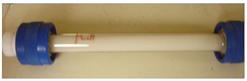 Bead packs as shown above are 1 cm in diameter and 15 cm long. All experiments involved single phase flow of brine or nutrients. Plastic end units threaded to accept Teflon unions to prevent microbe growth outside the column.