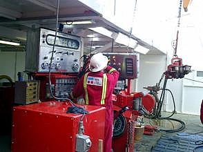 A top drive technician tests the Slider equipment soon after installation on a land rig working for Anadarko in Canada.