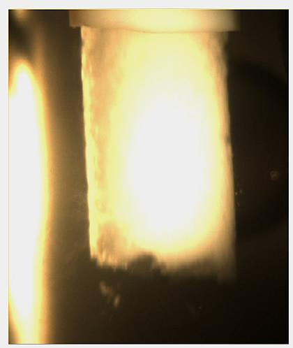 Figure 4. Picture of CO2-hydrate composite particles coming out of the CJHR.