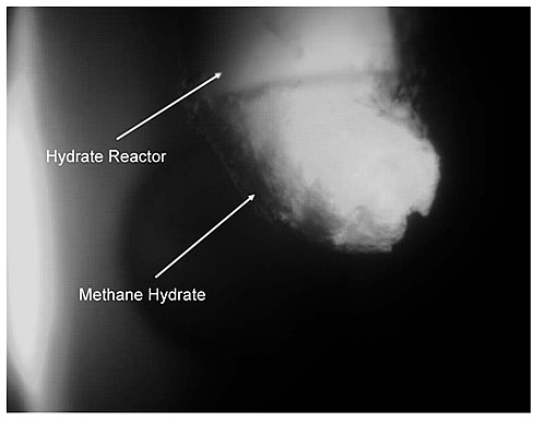 Figure 6. Picture of CH4-hydrate particles coming out of the CJHR.