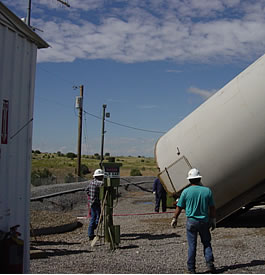 Placement of produced-water tank outside of test building.
