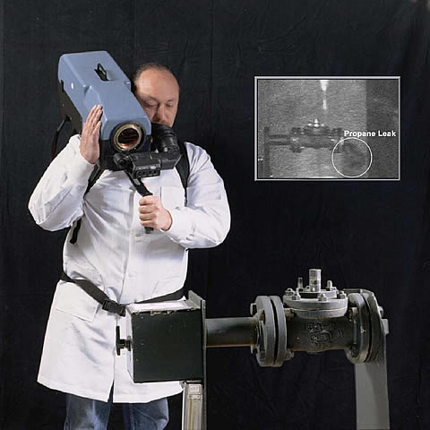 The operator-portable imager in use. The inset shows the gas image (propane, in this case) visible to the operator.