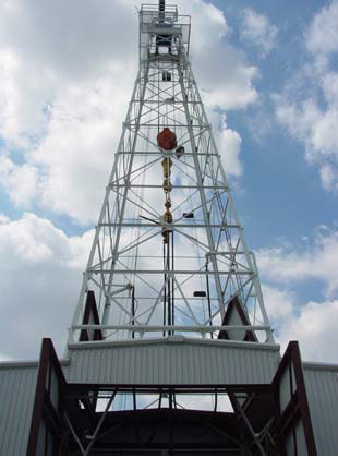 Testing of an existing 2 7/8-inch diameter turbodrill with PDC and impregnated diamond drill bits at the Catoosa, OK, drilling test facility.