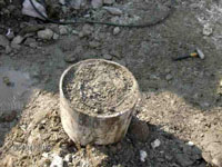 Casing and tubing full of cement after wellhead cutoff