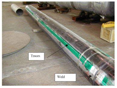 Segments of pipe with parallel sets of resistive traces applied to each of four pipe quadrants and connected across the segment welds via wires from solder pads at the end of each pipe segment.