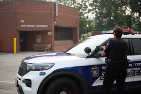 A police officer stands ready at NETL-Pittsburgh as part of a recent emergency preparedness drill.