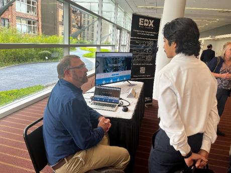 The EDX Team demonstrating the platform’s capabilities at the 2023 FECM/NETL Carbon Management Research Project Review Meeting.