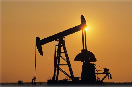 Sunset at an oil fracking site.