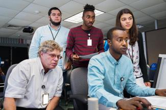 Left to right: Mickey Leland mentor David Tucker, Jose Pablo Cervantes, Kabian Ritter, Abdel Wadood Daoud, Marlene Llaugel