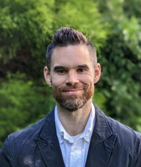 An outdoor headshot of Chris Bond.