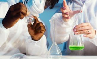 A man and a woman doing an experiment