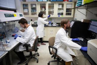 NETL researchers, left to right, Sam Flett, Djuna Gulliver and Dan Ross.