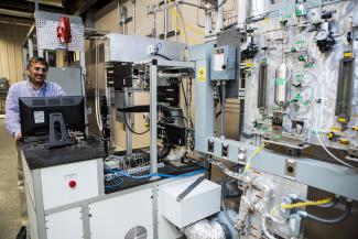 NETL researcher Dushyant Shekhawat working in the newly commissioned Reaction Analysis and Chemical Transformation (ReACT) facility in Morgantown.