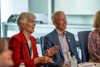 Secretary of Energy Chris Wright (right) smiles with NETL Director Marianne Walck.